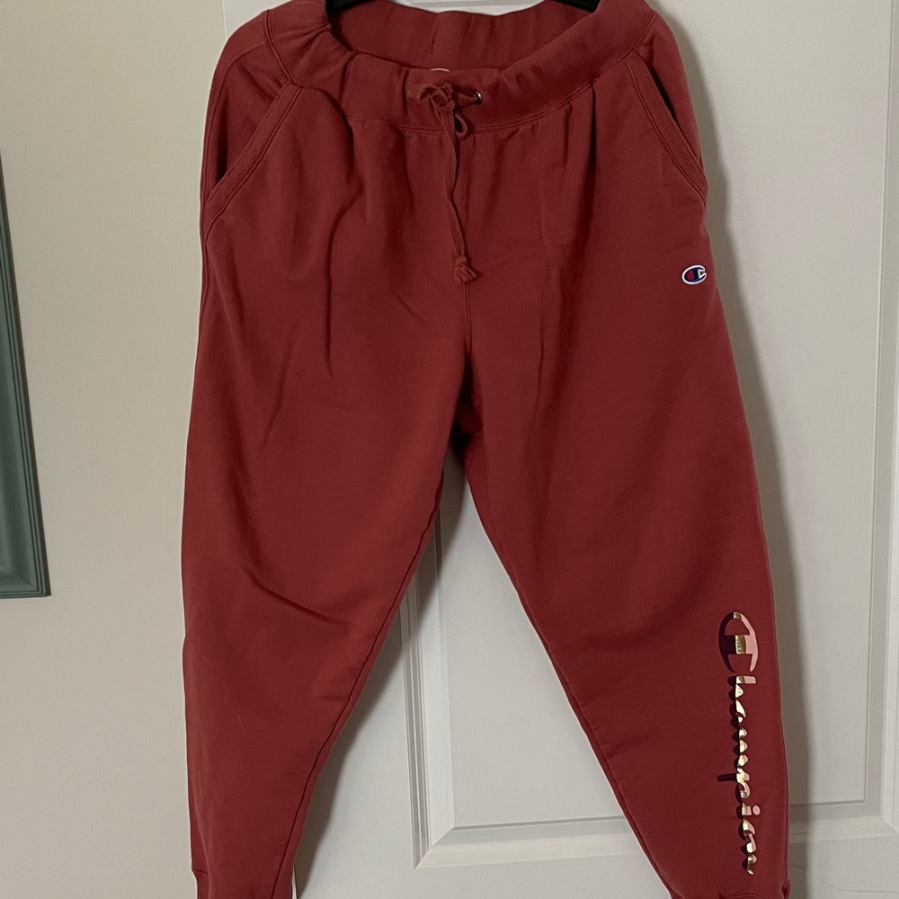 Champion Women’s deep coral color.  Jogger Sweatpants.